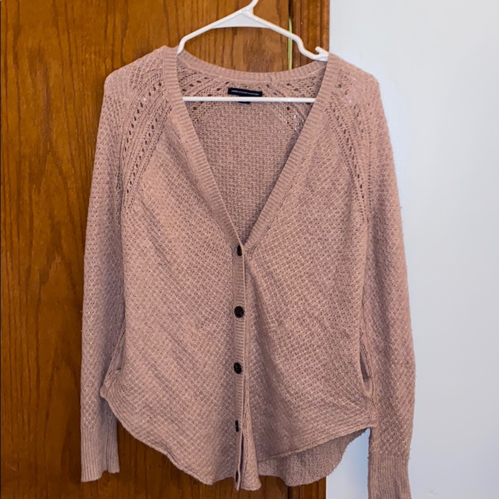 A sweater/ cover up